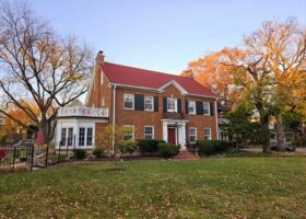 a two-story, four-bedroom brick home for sale in Oak Park